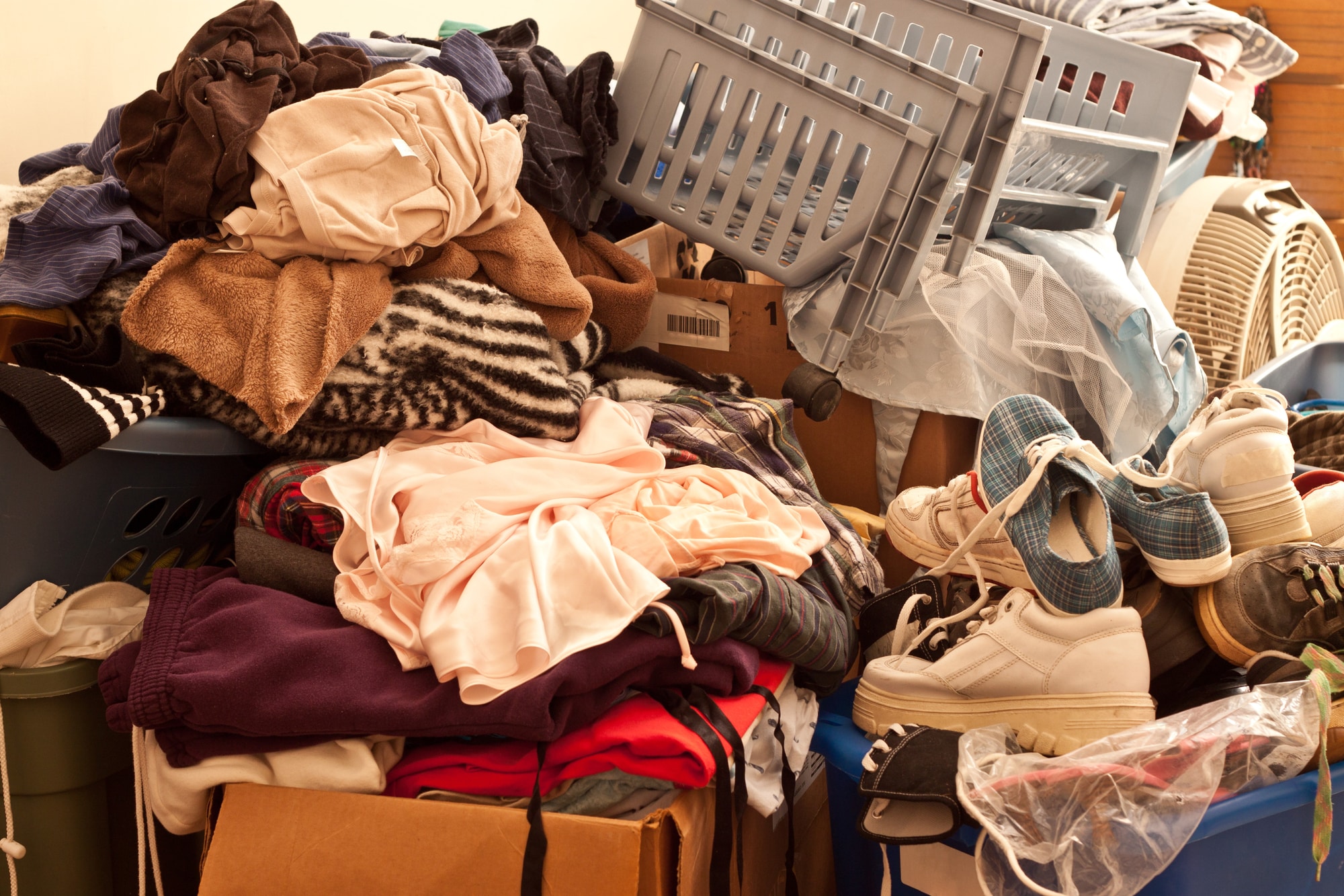Large pile of clothes accumulated by a hoarder